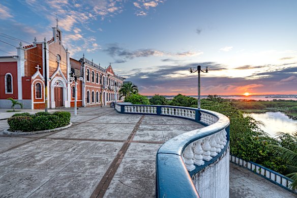 Dusk falls over the local river walk in the Peruvian city of Iquitos on the banks of the Amazon.
