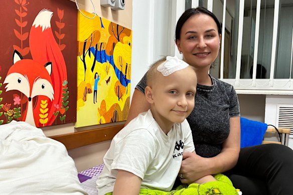 Olha Rauchuk and her son Ostap, 10, who is receiving weekly chemotherapy for a brain tumour.