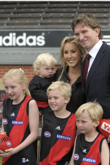 James Hird and wife Tania with their children, including Tom (centre) in 2010, when James was appointed coach of Essendon.