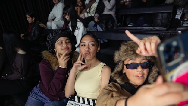 Western Sydney high school students Phoenix Varu, Rettalia Fraser, and Wyntah Rose take a selfie during a photography lesson at UTS.