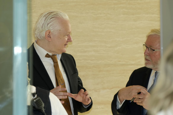 WikiLeaks founder Julian Assange with Australian ambassador to the United States Kevin Rudd.