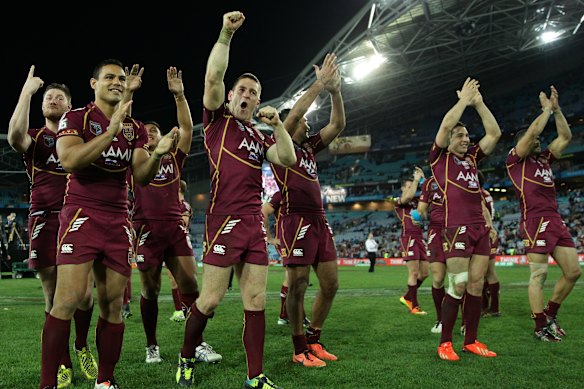 Queensland celebrate winning the decider at ANZ Stadium in 2013.