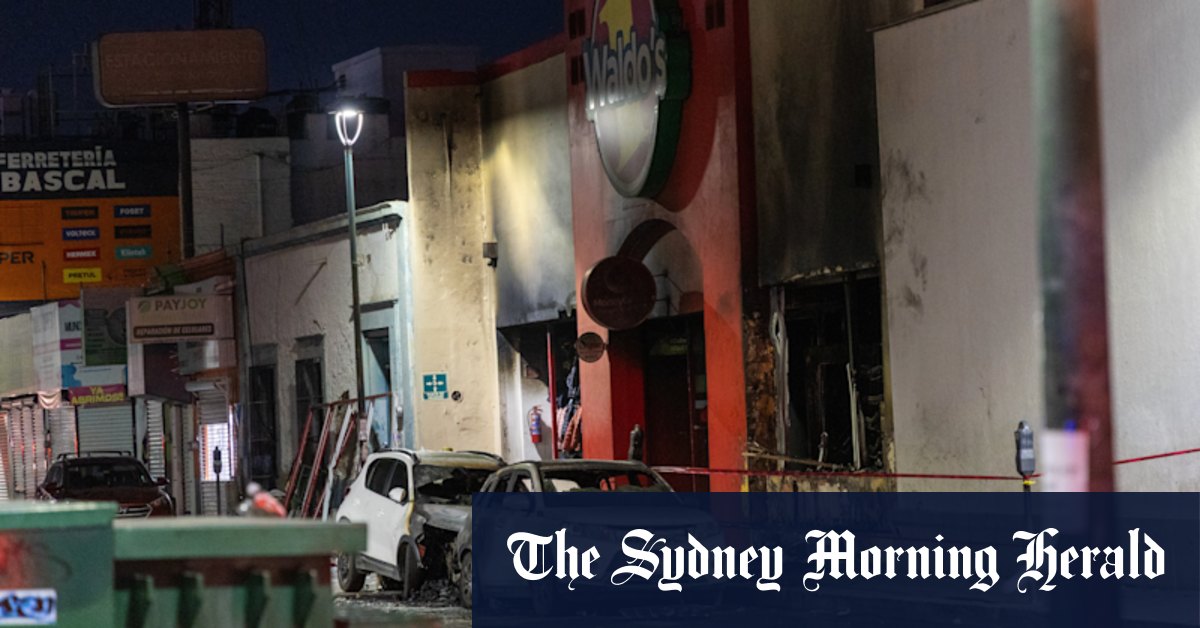 Children among dead as blaze engulfs discount store