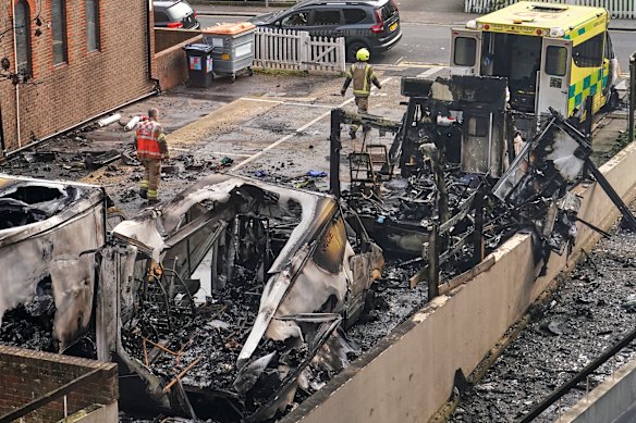 View at burnt ambulances in a car park at Golders Green in London, Monday, March 23, 2026 after an apparent arson attack on four vehicles belonging to a Jewish ambulance service, Hatzola Northwest.