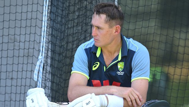 Marnus Labuschagne takes a break after hitting in the MCG nets.