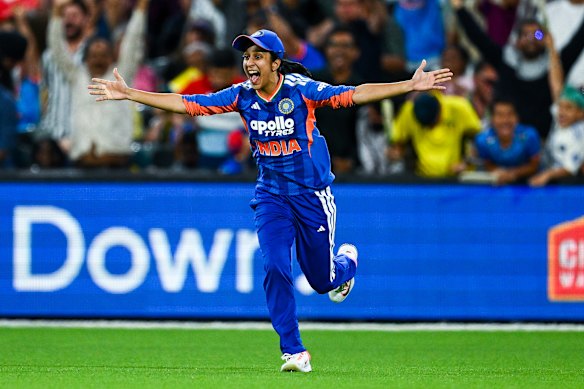 Jemimah Rodrigues celebrates after taking the outfield catch to dismiss Australia’s top run-scorer, Ashleigh Gardner.