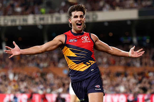 Crows star Josh Rachele celebrates a goal.