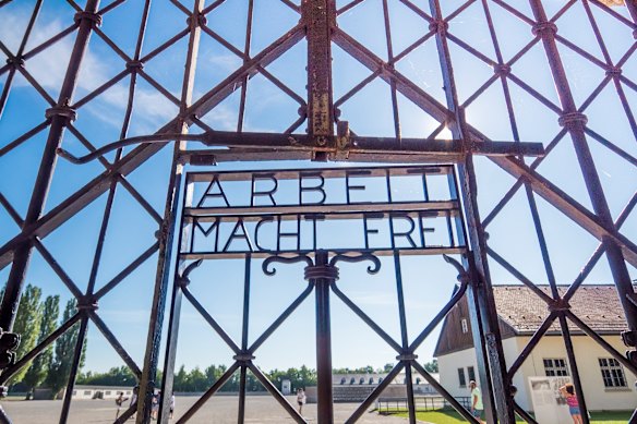 The entrance gate to the Dachau concentration camp near Munich holding the ominous words “work sets you free”.