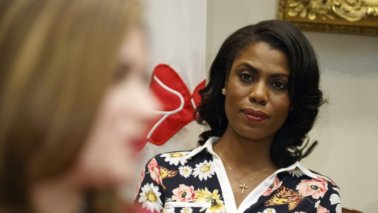 Omarosa Manigault Newman, then an aide to Trump, watches during a meeting with parents and teachers int he White House.