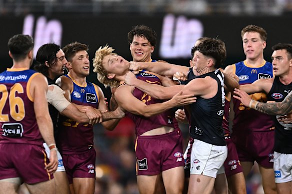 Sam Walsh gets stuck into Levi Ashcroft.
