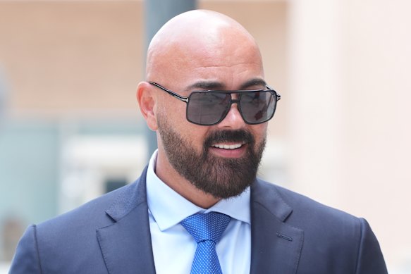 Joseph McBride, lawyer for Andrew and Tristan Tate, arrives at court in Miami.