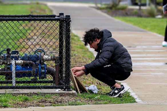 A friend lays tributes to Mickleham teenager Darweish Mohamed, who was found with critical injuries and died outside Craigieburn Community Hospital.