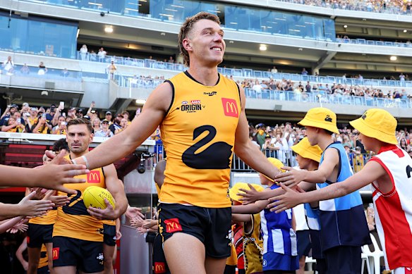 Patrick Cripps leads Western Australia out.