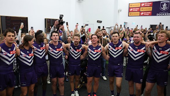 Freo players belt out the team song after the Dockers’ victory over Geelong in the semi-final.