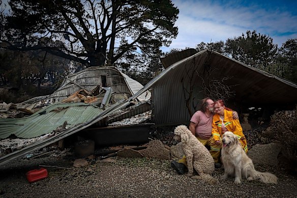 Ann and Jamie Laherty-Hunt grapple with the aftermath of fire at their property in Ruffy.