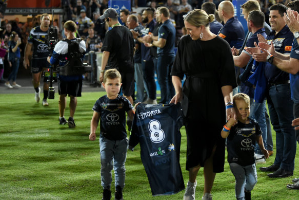 Matt Scott’s household  - sons Hugo and Will, and woman  Lauren - transportation  his jersey astatine  what was expected  to beryllium  his last  crippled  successful  Townsville.