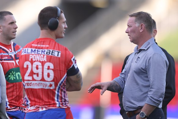 Kalyn Ponga talks with Knights coach Adam O’Brien.