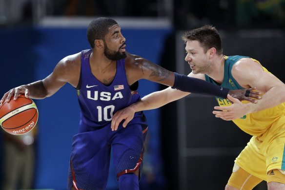 USA’s Kyrie Irving (left) faces off with Australia’s Matthew Dellavedova at Rio 2016.