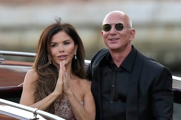 Newlyweds Lauren Sanchez Bezos and Jeff Bezos leave Venice.