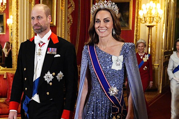 The Prince and Princess of Wales arrive for the state banquet at Windsor Castle on Wednesday.