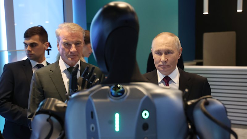 Vladimir Putin watches Russian AI robot dance