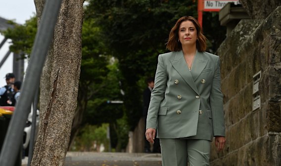 Communications Minister Anika Wells arrives for a press conference on Wednesday before attending an event at Kirribilli House to mark the world’s first social media ban for under-16s.