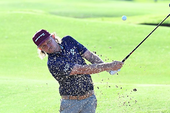 Cameron Smith plays a bunker shot.