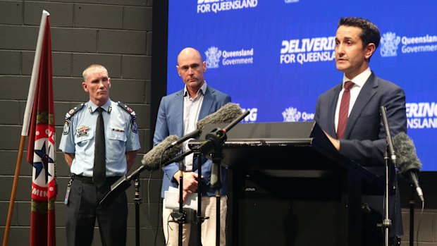 Queensland Premier David Crisafulli (right) gives an update on the cyclone on Saturday.