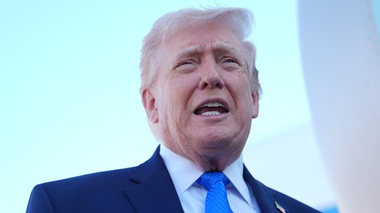 US President Donald Trump speaking to reporters on Monday after his Truth Social post.