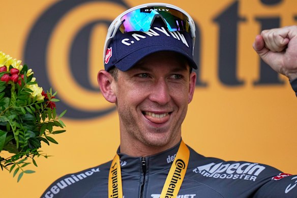 Groves celebrates on the podium after his stage win.