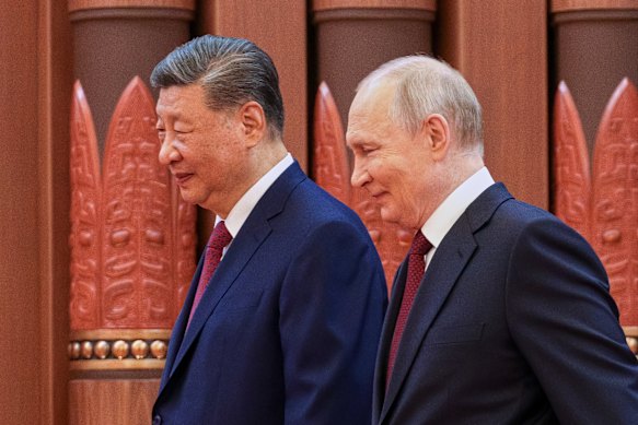 Xi Jinping and Vladimir Putin in Beijing today on their way to talks in the Great Hall of the People.