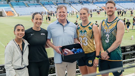 The NFL has arrived in Queensland: (from left to right) Mexico flag football captain Diana Flores, global flag football ambassador Kodie Fuller, NFL commissioner Roger Goodell, Australian women’s star Abbie Leyshon and Australian men’s star Jared Stegman.