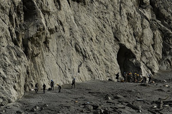 Search-and-rescue teams at the exit tunnel of the Chilime Hydropower Station near Syabrubesi, where workers are believed to be trapped.