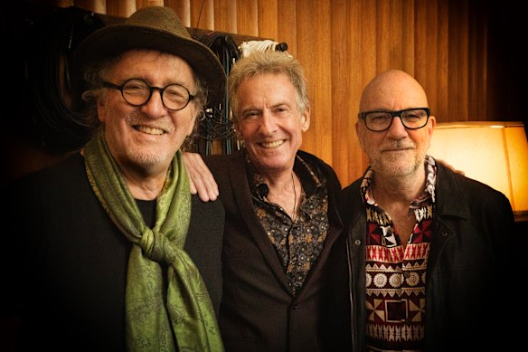 Rob Hirst (centre) with bandmates Jim Moginie (left) and Hamish Stuart.