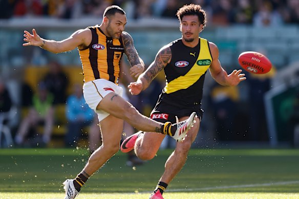 Jarman Impey is fleet of foot and kicks a running goal on Sunday.