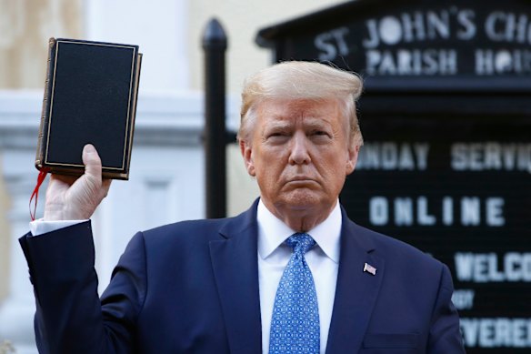 Donald Trump holds a Bible outside St John’s Church in Washington during his first term in June 2020.
