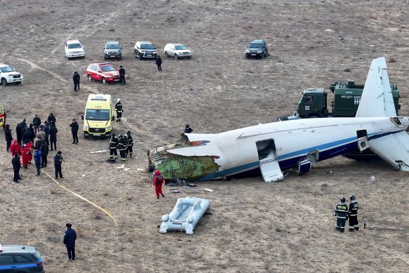 The wreckage of the Azerbaijan Airlines Embraer 190 lays on the ground near the airport of Aktau.