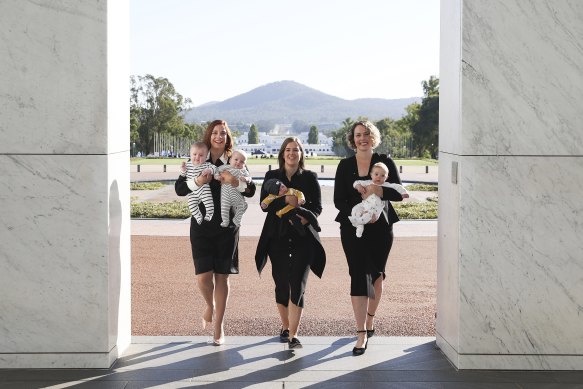 Labor MPs Anika Wells with her twins, Kate Thwaites and Alicia Payne with their babies return to parliament from maternity leave in 2021.