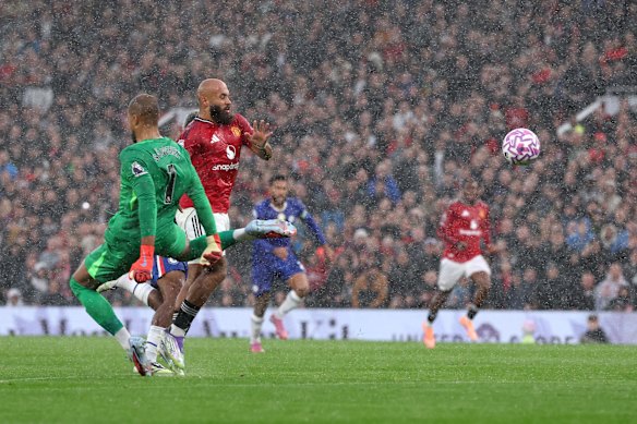 Bryan Mbeumo of Manchester United is fouled by Chelsea’s Robert Sanchez, who was red cardded.