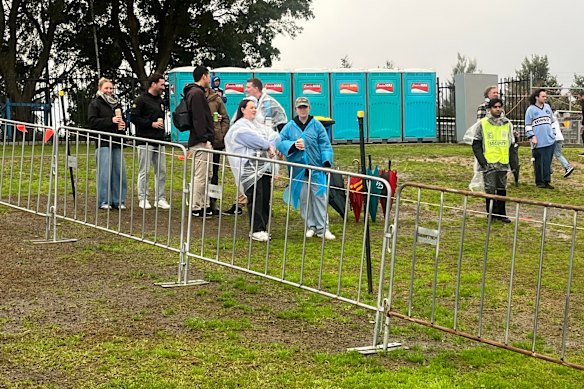 The portaloos are a game-day feature on the hill at Shark Park.