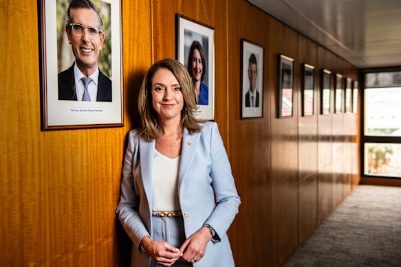 Kellie Sloane and the Liberal wall of fame in NSW Parliament House.