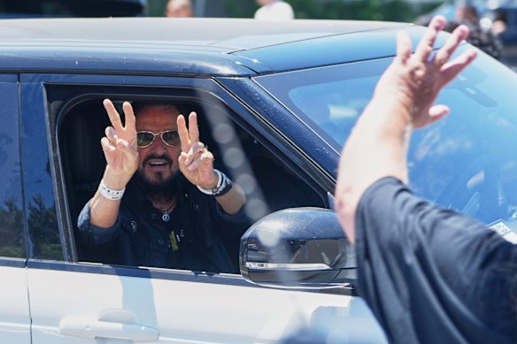 Ringo Starr, left, flashes peace signs from his car as he leaves the annual Peace &amp; Love celebration, this year marking his 86th birthday in Beverly Hills, Calif., Tuesday, July 7, 2026.