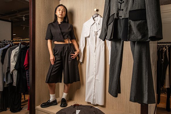 Sydney designer XiXi Wu at Chinatown Country Club, where her clothes are sold. She wears a two-piece suit from her coming collection.