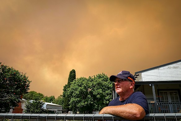 Paul Heyen decided to stay back in fire threatened Yea and put buckets of water throughout his front yard.