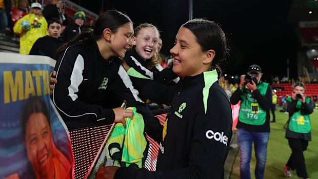 Sam Kerr interacts with Matildas fans after the 2-0 win over New Zealand in Adelaide.