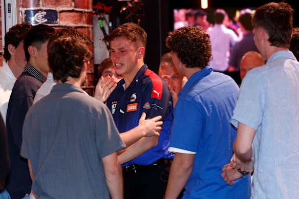 An emotional Sam Grlj was swamped by friends and family after Andrew Dillon read his name out.