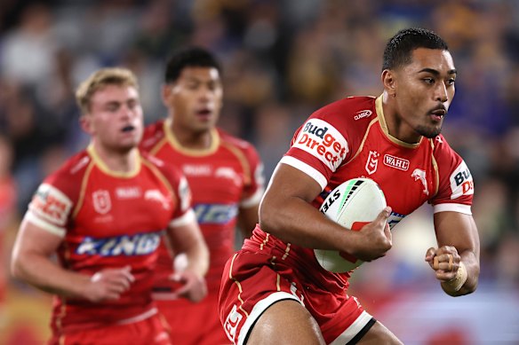 Connelly Lemuelu runs the ball in a match against the Eels in Sydney.