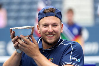 Dylan Alcott celebrates after defeating Niels Vink at the US Open to complete a golden grand slam.