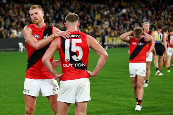 Peter Wright consoles Jayden Laverde after the final siren.
