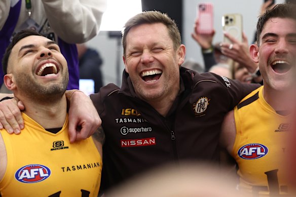 Jarman Impey, Sam Mitchell and Jai Newcombe belt out their song.